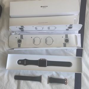 Rose gold Apple Watch series 1, charger & 2 bands